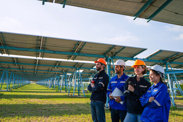 Engineers are working at solar farm.