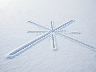 Snow Star Design in Freshly Fallen Snow
