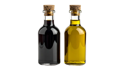 Two small glass bottles with cork stoppers, one holding dark liquid, the other yellow