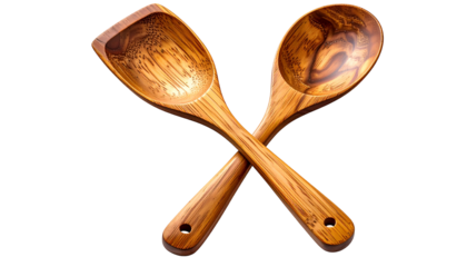 Two wooden kitchen utensils, a spatula and spoon, crossed, against black