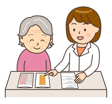薬の説明をする若い女性薬剤師と患者のおばあさん