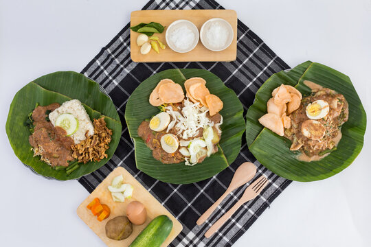 Variety of Indonesian Traditional Cuisine, Lotek and Gado-Gado with Peanut Sauce and Crackers on White Background