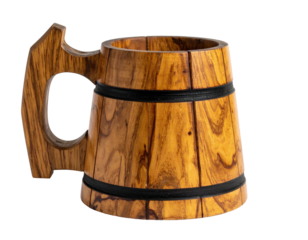 Close-up studio shot of a handcrafted wooden mug with a unique handle, isolated on black