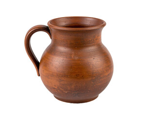 Rustic, brown, ceramic pitcher with a handle, photographed against a black background