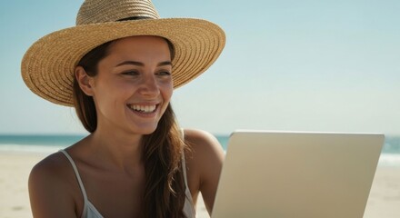 Smiling woman works at beach with laptop