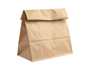 A close-up studio shot of a brown paper bag, mostly empty, isolated against a black backdrop