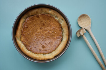 Homemade cheese cake in baking pan
