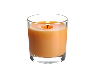 Glowing candle in a clear glass container against a pure black background