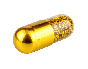 A close-up shot of a golden pill capsule filled with glistening golden flakes