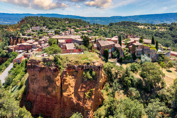 Exploring the scenic beauty of Roussillon in Vaucluse, France, Provence. Nestled atop a hill,...