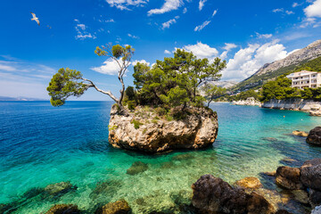 Kamen Brela symbol of the city of Brela on Adriatic coast of Dalmatia, Croatia. Kamen Brela, tiny famous island in Brela, Makarska Riviera, Dalmatia, Croatia. © daliu