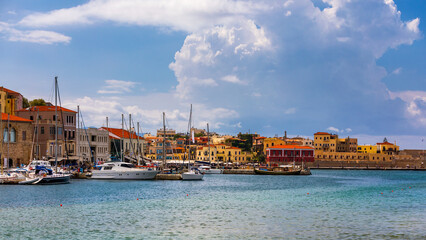 Picturesque old port of Chania. Landmarks of Crete island. Greece. Bay of Chania at sunny summer day, Crete Greece. View of the old port of Chania, Crete, Greece. The port of chania, or Hania.