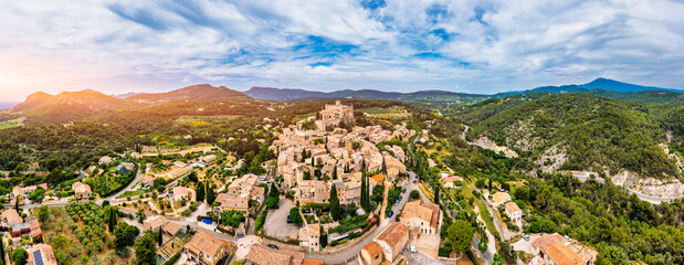 The beautiful medieval town of Le Barroux, Vaucluse, Provence, France. Aerial view of Le Barroux village with its castle, Provence, France. Perched village of Barroux and its fortified castle, France.