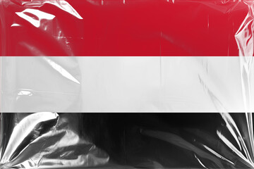 Flag of Yemen Under Wrinkled Transparent Plastic Film, Showing the National Colors Red, White, and Black with Distorted Reflections