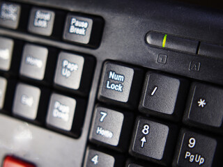 key board foe computer and butom active in black and red color