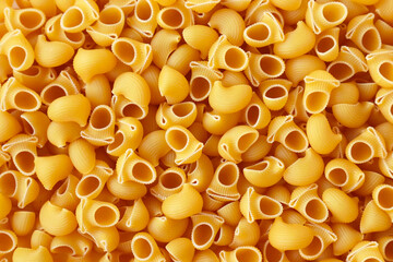 Uncooked,dry Turkish ravioli,pasta background,top view