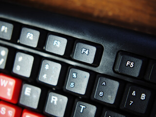 key board foe computer and butom active in black and red color