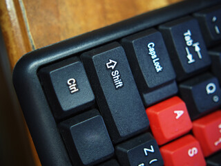 key board foe computer and butom active in black and red color