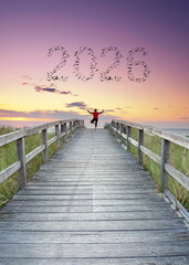 yoga exercise on a wooden pier with flying birds in shape of 2026