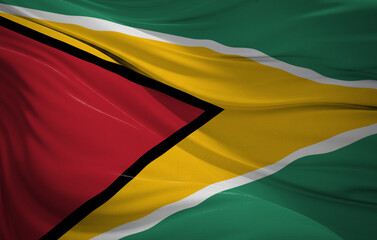 national flag of Guyana, the Golden Arrowhead, with vibrant green, gold, and red fabric.