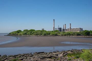 Fototapeta premium View of a factory from the Costanera Sur Reserve - Buenos Aires, Argentina