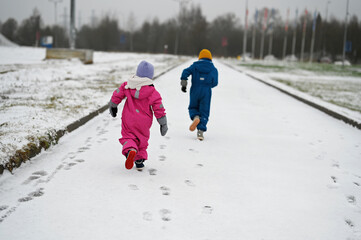 three siblings on winter day