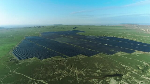 Aerial drone view of photovoltaic solar power plant station renewable energy electricity. Solar panel fields demonstrating renewable energy innovation.