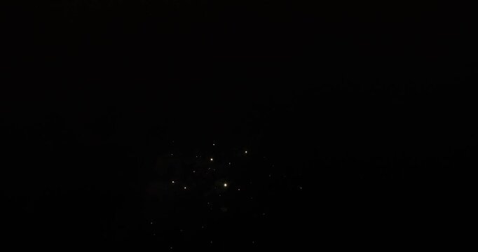 Slow motion fireworks with empty space seamless loop