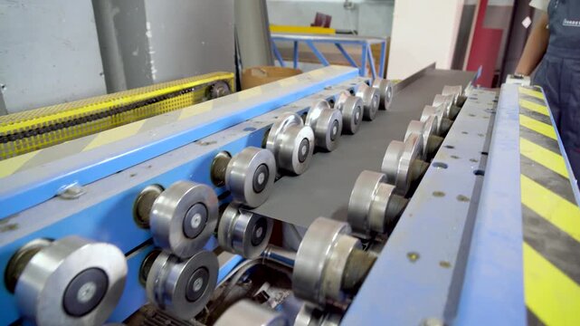 Production Line Of Metal Tile For Roof. Steel Forming Machine In Metalwork