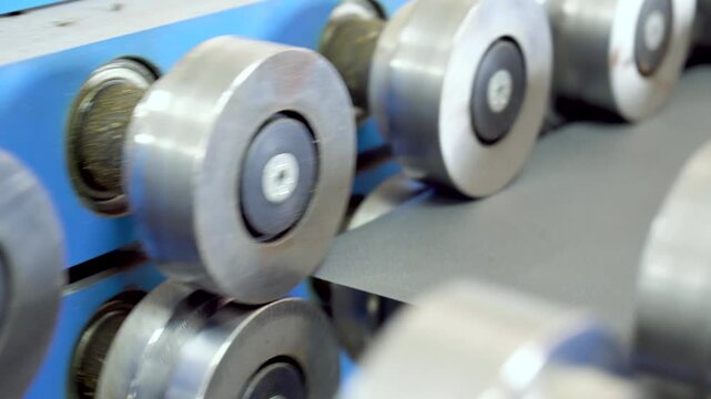 Production Line Of Metal Tile For Roof. Steel Forming Machine In Metalwork