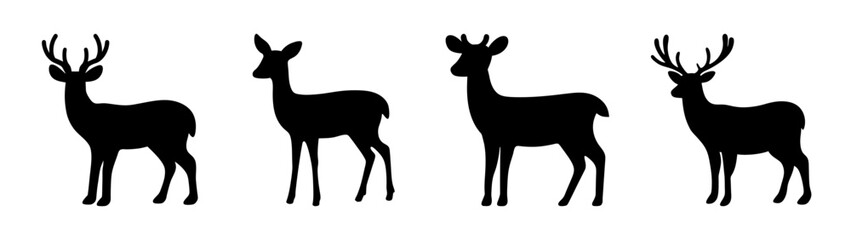 Obraz premium Four silhouetted deer