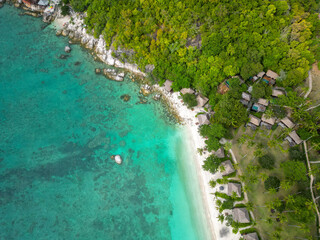 Fototapeta premium Aerial view of Koh Tao island in Thailand, showcasing turquoise waters, tropical beaches, coral reefs and lush coastline in the Gulf of Thailand captured by drone