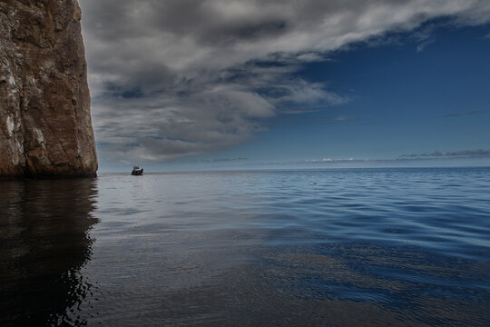 Kicker Rock, also known as Le&oacute;n Dormido, is one of the most iconic landmarks in the Gal&aacute;pagos Islands. This stunning rock formation rises dramatically from the ocean, resembling a sleeping lion.