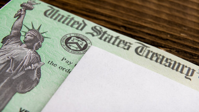 Tax Refund check on wooden table