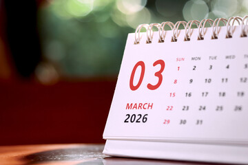 Calendar page of March 2026 on desk, with copy space. monthly planning concept, important schedules, meetings, and appointments.