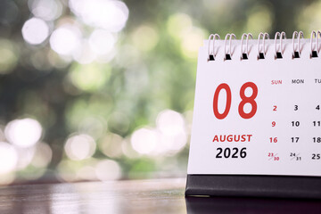 Calendar page of August 2026 on desk, with copy space. monthly planning concept, important schedules, meetings, and appointments.