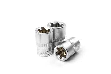 Set of interchangeable heads for ratchet wrench isolated on white background.