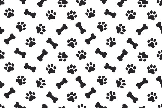 A playful pattern of black paw prints and dog bones on a white background