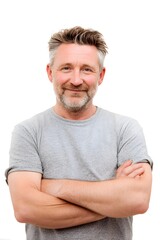 Obraz premium casual portrait of a smiling middle-aged man with crossed arms on a white background