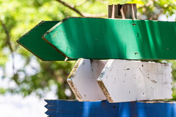 Wooden direction boards in the forest