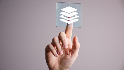 Layered Digital Interface Concept with Hand Gesture Interacting with Virtual Layers Icon for Modern Technology and User Experience Design in Software Applications