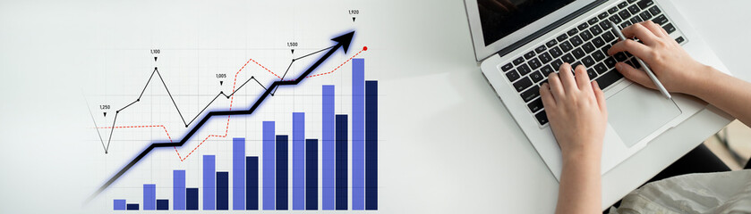 A visual representation of business growth featuring charts and graphs alongside a person working...