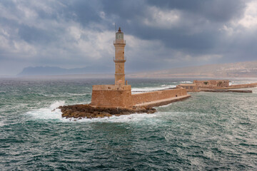 Historic Venetian Lighthouse at the entrance of the Old Harbor in Chania, Crete, Greece