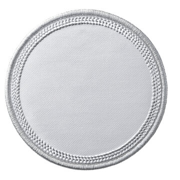Blank circular white fabric patch with braided stitched border isolated on a transparent background
