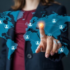 Person in business attire touching a glowing point on a digital map with interconnected user interconnected user glowing point