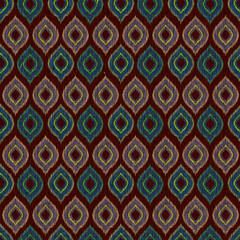 Rich Seamless Ethnic Ikat Teardrop Pattern: Traditional Handwoven Motif in Deep Maroon, Olive, and Teal Colors, Evoking Primitive Textile Art and Tribal Heritage.