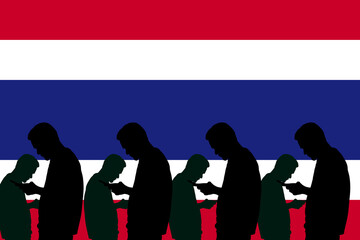 Silhouettes of people addicted to smartphones against Thai flag with digital network overlay. Concept of mobile obsession and connectivity in Thailand