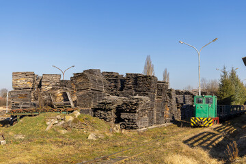 Narrow gauge train with a green locomotive in Csomoder railway station