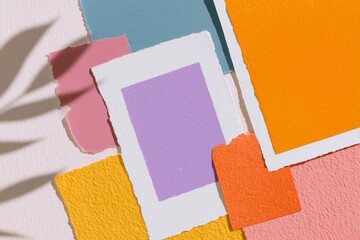Colorful photo collage vision board template with vibrant textured paper pieces arranged artistically on a light background, perfect for creative inspiration and personal expression