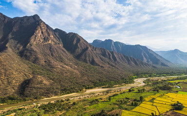 Naklejka premium Rural landscape of Mayascón village surrounded by mountains in Lambayeque, Peru